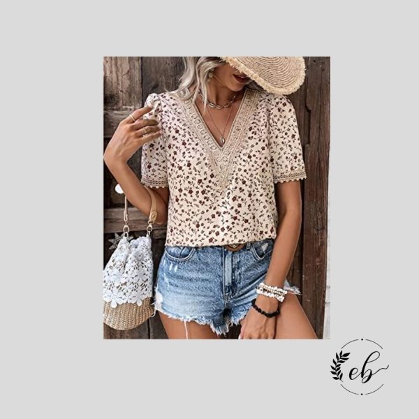 Blusa con mangas abullonadas, encaje de guipur y estampado de flores ditsy.