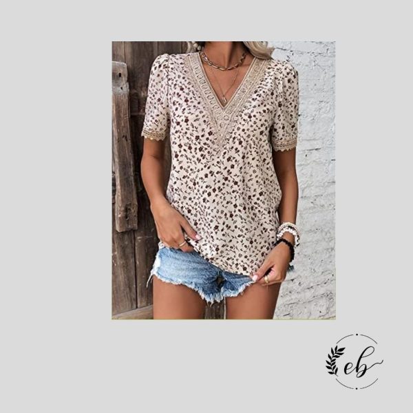 Blusa con mangas abullonadas, encaje de guipur y estampado de flores ditsy.