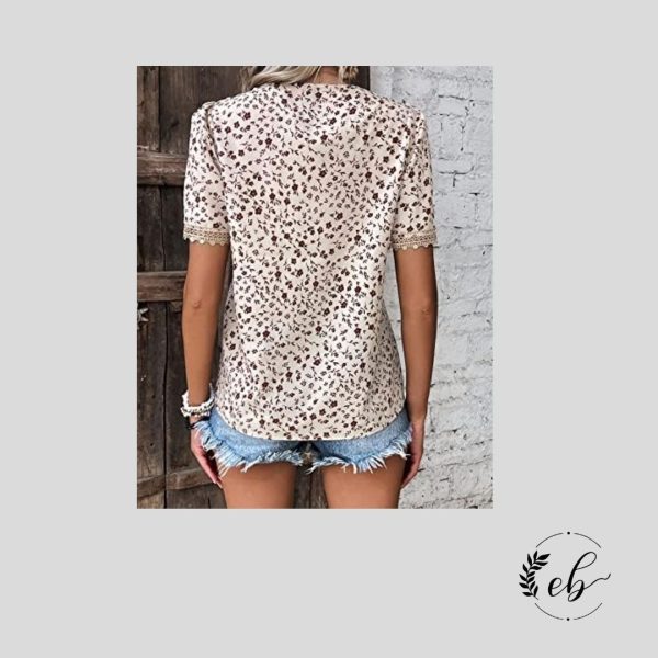 Blusa con mangas abullonadas, encaje de guipur y estampado de flores ditsy.